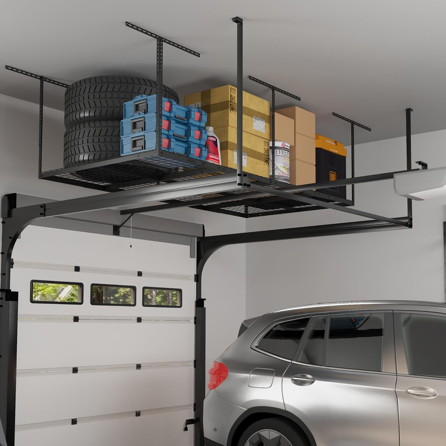 Overhead garage storage rack holding tires, storage boxes, and containers above a parked car. The structure maximizes space using a metal grid design suspended from the ceiling.