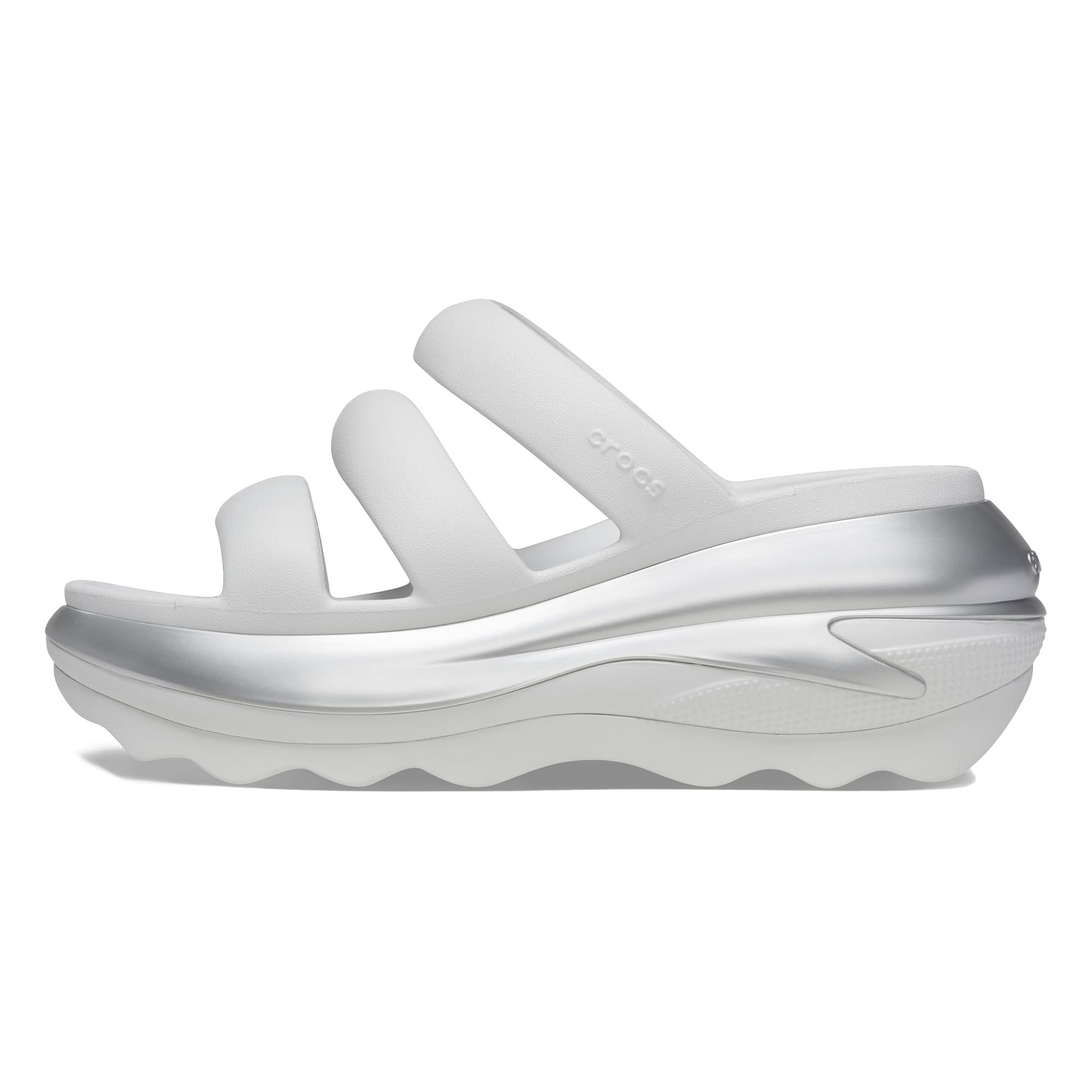 A white and silver sandal with three thick straps and a textured, platform sole.