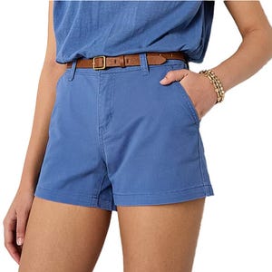 Blue high-waisted shorts with a brown belt, paired with a matching blue top.