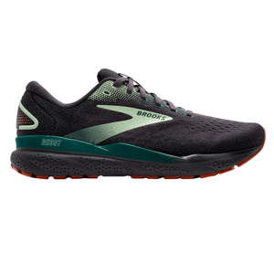 Brooks running shoe in black with green accents, labeled \“Ghost,\“ featuring a cushioned sole and sturdy tread for support and grip.