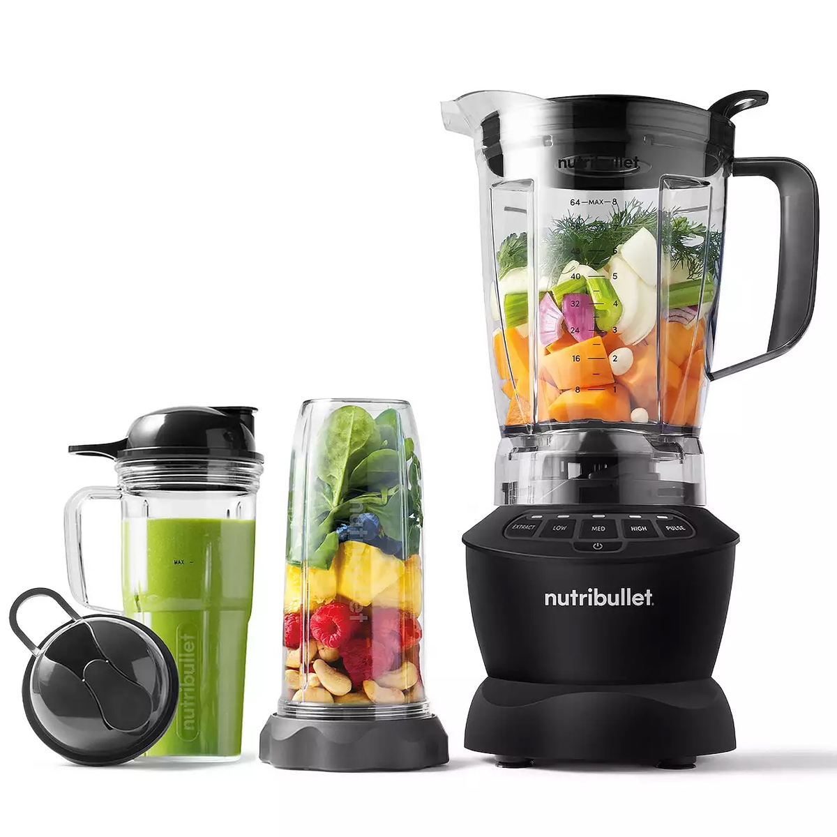 Nutribullet blender system with multiple containers: a large pitcher filled with vegetables, a portable cup with a drinking lid containing a green smoothie, and a smaller container with fruits and nuts.