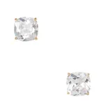 A pair of cushion-cut diamond stud earrings set in four-prong gold settings.