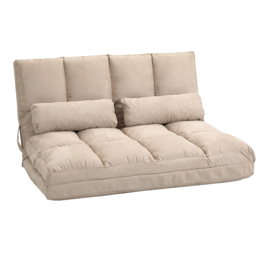 A beige convertible futon sofa bed with a tufted design, featuring adjustable backrests and two cylindrical bolster pillows for added comfort.