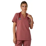 A person is wearing a matching set of maroon scrubs, consisting of a short-sleeve top with a chest pocket and matching pants, while holding a stethoscope around their neck.