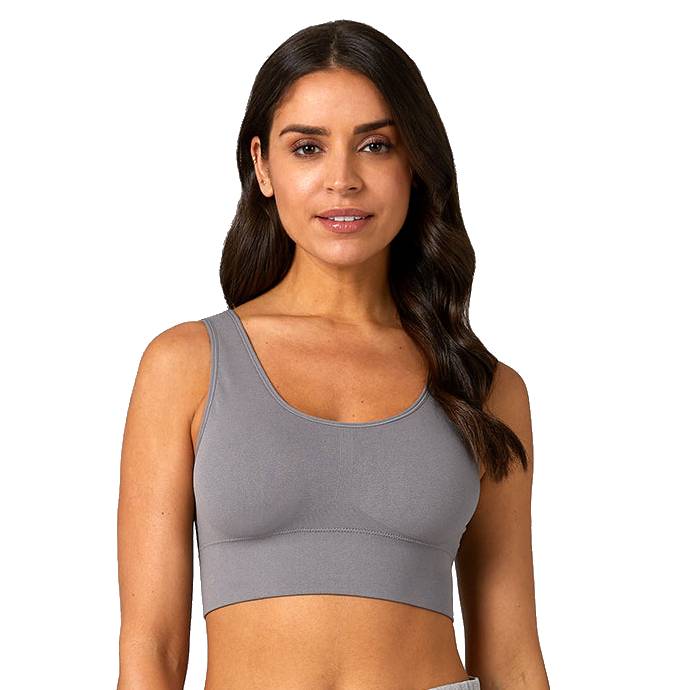 A woman wears a gray crop top with a scoop neckline and wide shoulder straps, suitable for casual or athletic wear.