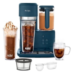 The Mr. Coffee Blender & Coffee Maker combo is a navy blue appliance designed for making iced coffee, featuring a blender, an iced coffee tumbler, a glass mug, a mesh filter, and a measuring scoop.