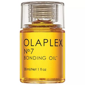 Olaplex No. 7 Bonding Oil is a hair treatment oil designed to strengthen, repair, and hydrate all hair types, adding shine and providing heat protection up to 450°F/232°C. This lightweight product is offered in a 30ml (1 fl oz) bottle.