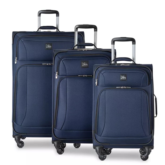 A set of three blue rolling suitcases of varying sizes with telescopic handles.