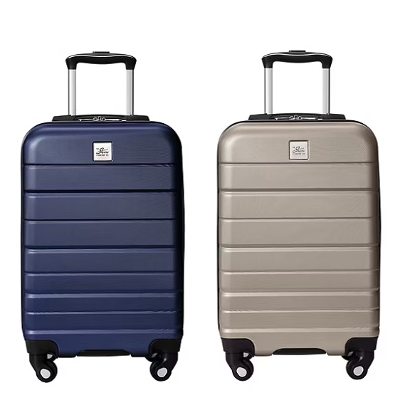 Two hard-shell suitcases, one blue and one beige, with telescoping handles and four wheels.