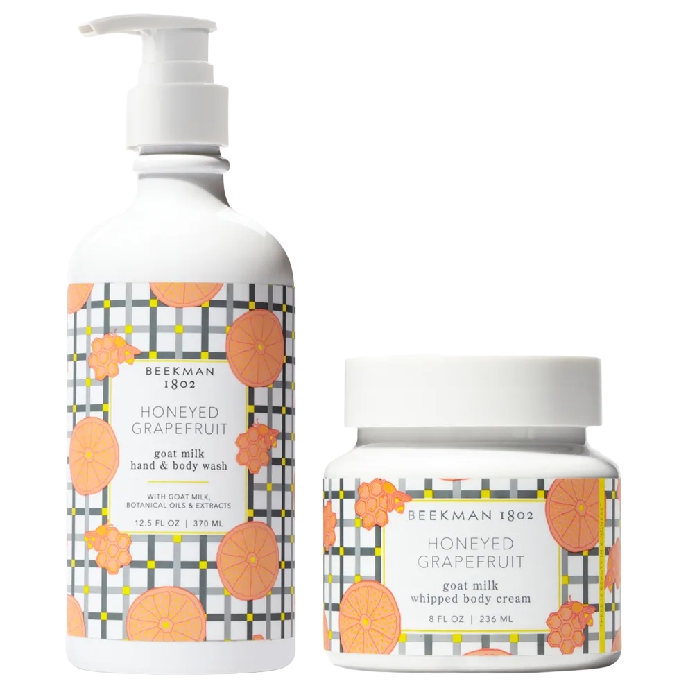 Beekman 1802 Honeyed Grapefruit set includes a 12.5 fl oz goat milk hand and body wash and an 8 fl oz whipped body cream, featuring a citrus and honeycomb design.