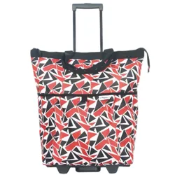A wheeled tote bag with a retractable handle and red, black, and white abstract geometric pattern.