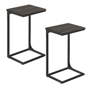 A pair of modern C-shaped side tables with dark wooden tops and black metal frames, designed for sliding under furniture.