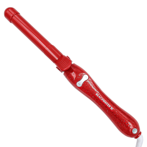 The Beachwaver 1\“ Barrel Curling Iron is a red, glittery, rotating curling iron with a 1-inch barrel, featuring buttons for controlling rotation direction and a power button for ease of use.