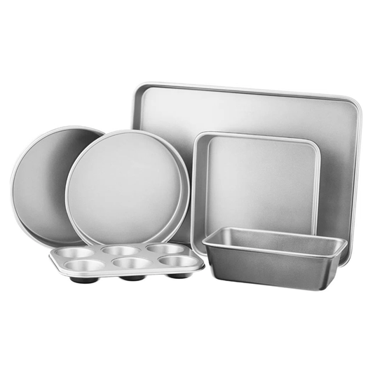 A set of baking pans includes a muffin tin, two round cake pans, a loaf pan, a square pan, and a rectangular baking sheet, all made of silver metal.