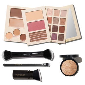 Laura Geller Full Face Kit includes face palettes with contour, blush, and eyeshadows, a setting powder, and three makeup brushes designed for application.