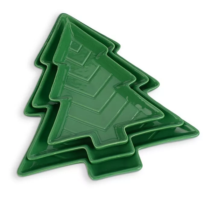 Green, tree-shaped nesting serving trays in three sizes, made of ceramic.
