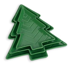 Green, tree-shaped nesting serving trays in three sizes, made of ceramic.