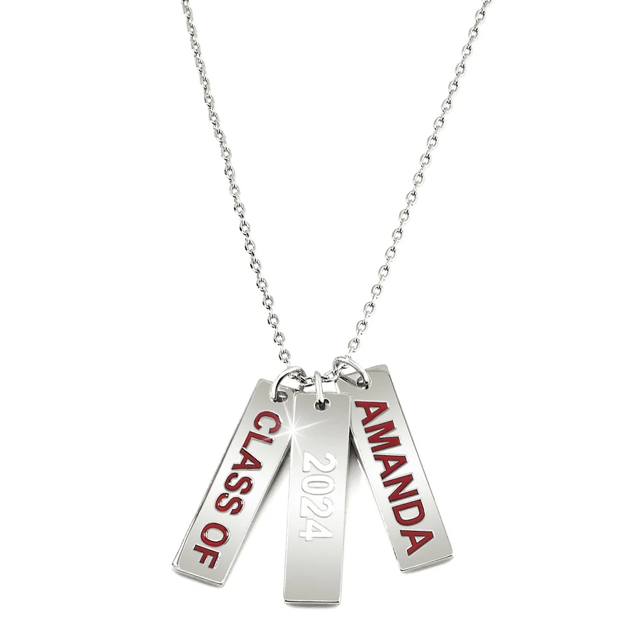 A silver necklace features three rectangular pendants inscribed with \“CLASS OF,\“ \“2024,\“ and \“AMANDA\“ in red lettering.