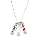 A silver necklace features three rectangular pendants inscribed with \“CLASS OF,\“ \“2024,\“ and \“AMANDA\“ in red lettering.