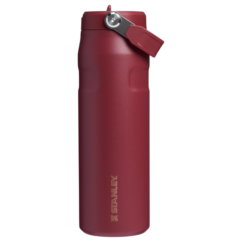 Red Stanley stainless steel water bottle with a flip lid and carrying handle, featuring the Stanley logo etched on the side.