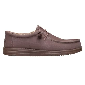 A brown casual slip-on shoe with moccasin-style stitching, featuring a textured sole and a simple lace design.