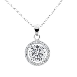 A silver chain necklace featuring a round pendant with a large central gemstone surrounded by smaller stones in a circular halo design.