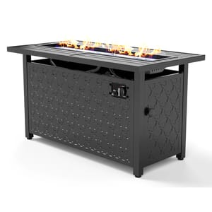 Rectangular propane fire pit table with decorative patterned sides and flame controls on the front panel.