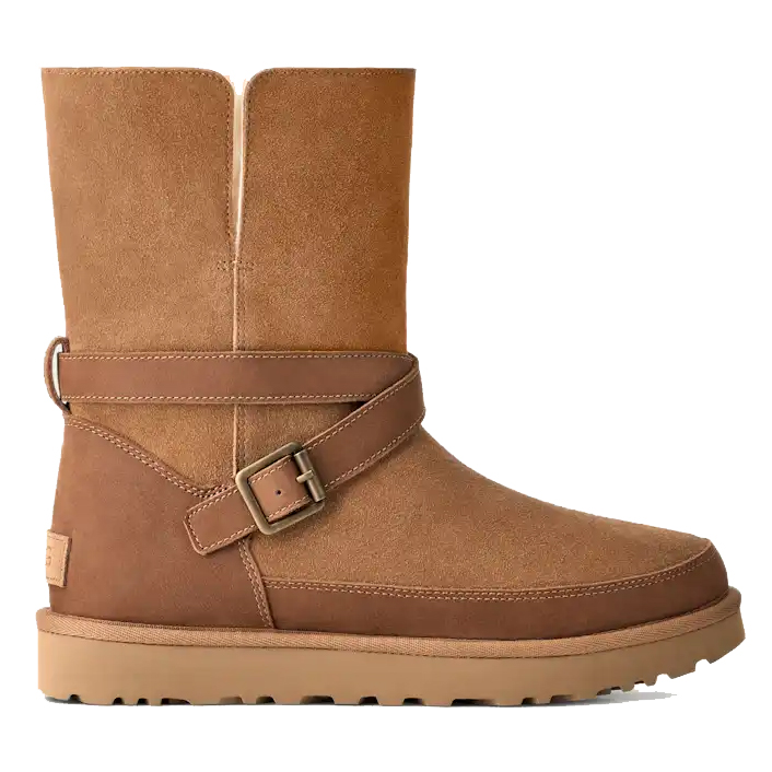 A brown suede mid-calf boot with a decorative strap and buckle design, featuring a flat outsole for stability and comfort.