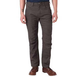 A person wearing dark brown pants paired with brown leather boots.