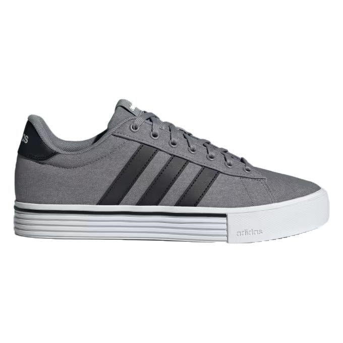 A gray sneaker with black stripes and a white sole.