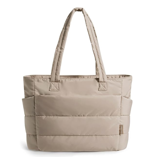 A beige quilted tote bag with dual handles and a side pocket.