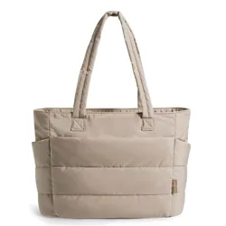 A beige quilted tote bag with dual handles and a side pocket.