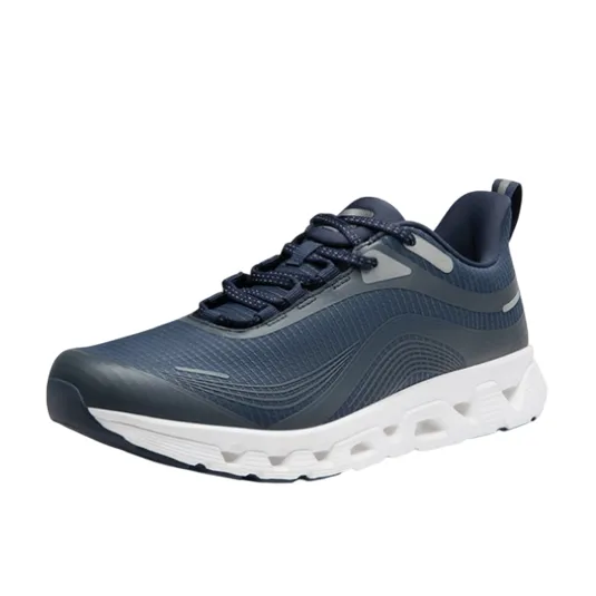 A navy blue athletic sneaker with a textured design, featuring a white cushioned sole and lace-up closure, suitable for sports or casual wear.