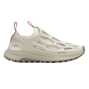 Merrell slip-on shoe with a breathable mesh design, featuring a cream color, rugged sole, and pull-tabs for easy wear.