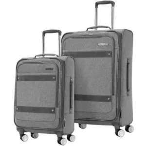 Two grey wheeled suitcases with telescopic handles, featuring front pockets and a four-wheel system for easy mobility.