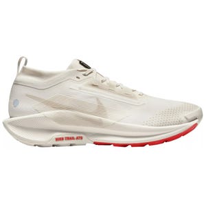 Nike Pegasus Trail 5 Running Shoes are designed for trail running, featuring a white breathable upper with subtle texture, red accents on the sole, and a supportive, cushioned midsole for comfort and stability.