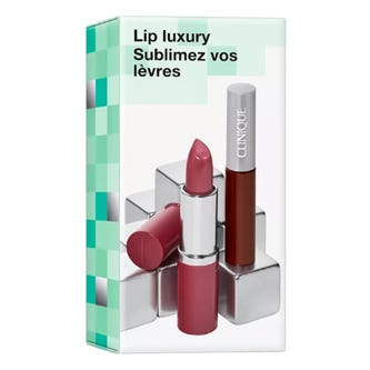 Clinique Lip Luxury set includes a pink lipstick and a liquid lip gloss in a sleek tube, packaged with silver accents for a polished look.