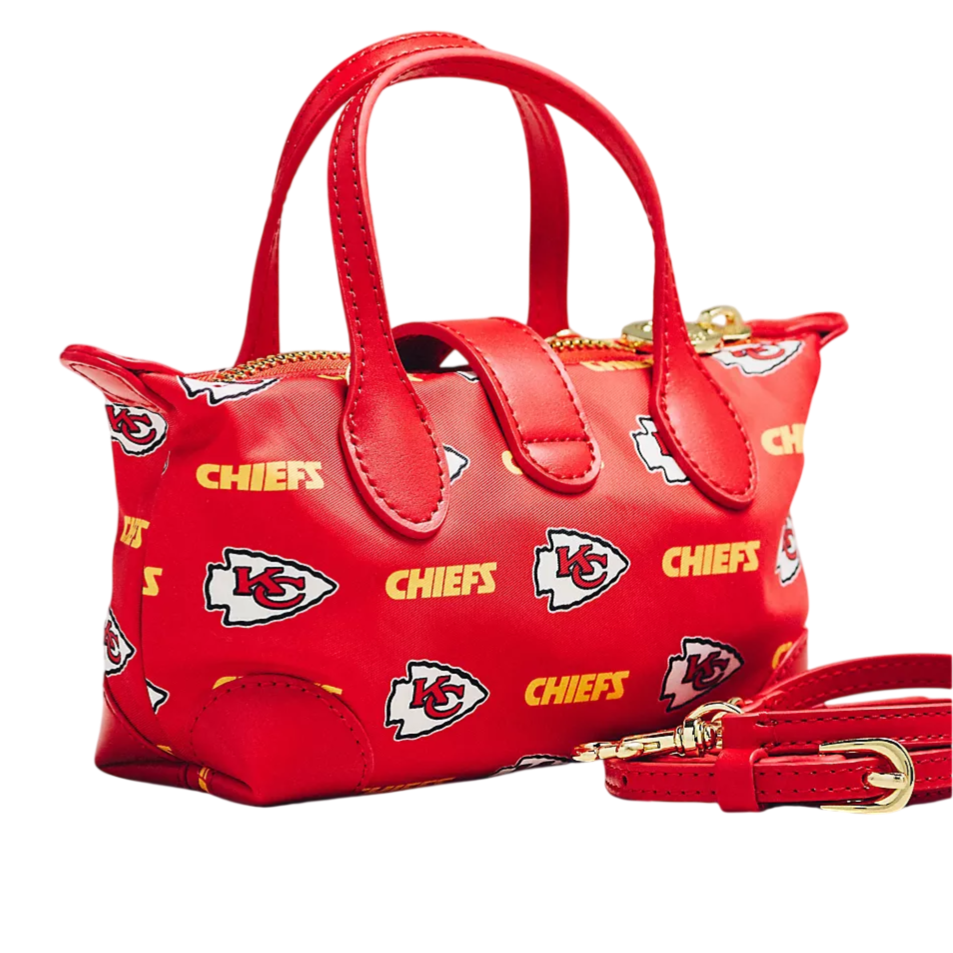 Red handbag with Kansas City Chiefs logo and \“CHIEFS\“ text, featuring a gold zipper and detachable strap.