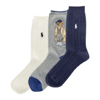Three pairs of socks featuring a bear graphic and embroidered logos in white, grey, and navy colors.