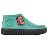 A turquoise Clarks shoe featuring a textured circle design on the side, with a black ribbed sole, and hanging tags displaying the collaboration with Pokémon.