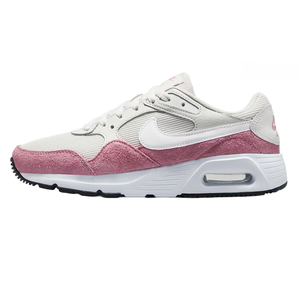 A white and pink Nike sneaker featuring a suede and mesh upper with a visible Air Max unit and black outsole.