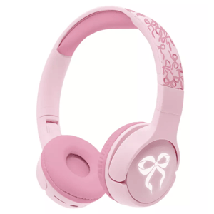 Pink over-ear headphones with a ribbon design on the headband and a glowing bow icon on the ear cup.