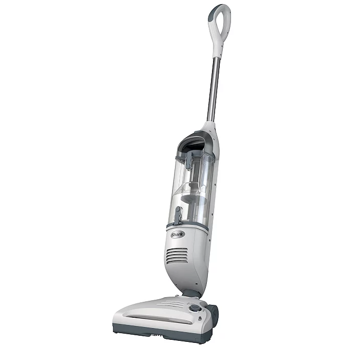 An upright vacuum cleaner with a transparent dust container and ergonomic handle, designed for household cleaning.