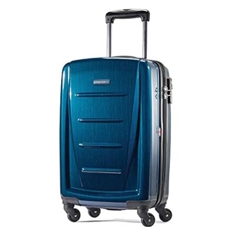 Samsonite Spinner Carry-On in blue features a hard-shell design with a telescopic handle and four multidirectional spinner wheels for easy mobility. It has a TSA-approved lock and a sleek, modern appearance.