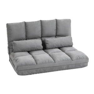Gray cushioned futon sofa bed with adjustable backrest and two cylindrical pillows.