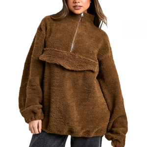 Brown, oversized sherpa sweatshirt with a half-zip design and high collar, offering a cozy, textured look.
