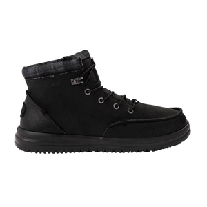 A black high-top lace-up boot with a textured sole and a padded collar.
