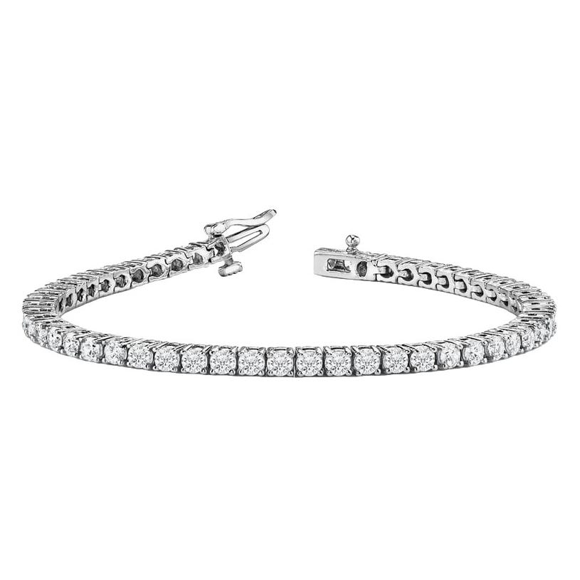 A diamond tennis bracelet with a sleek line of square-cut stones set in a white metal setting, featuring a secure clasp.