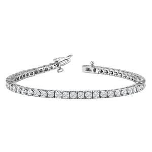 A diamond tennis bracelet with a sleek line of square-cut stones set in a white metal setting, featuring a secure clasp.