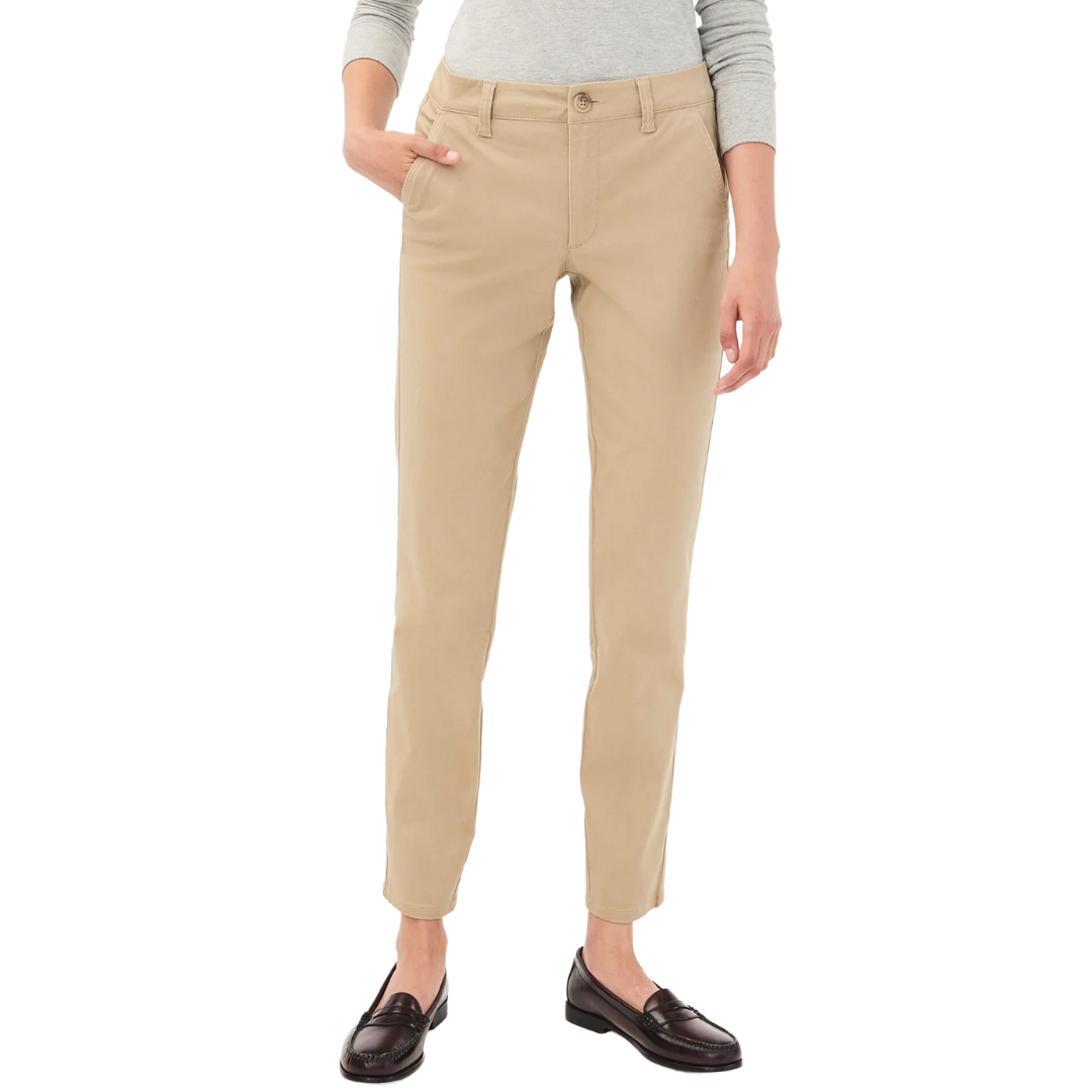 Khaki pants paired with a light gray long-sleeve shirt and brown loafers.